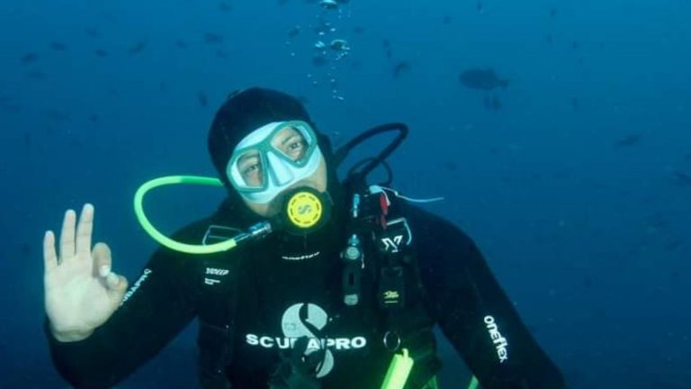 Jorge Jurado, also known as Wild George, giving the OK signal while diving in Galápagos.
